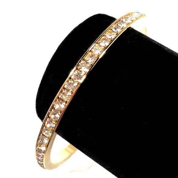 Avon Jewelry - BRACELET - GOLD-TONE CIRCLE with 69 RHINESTONES.